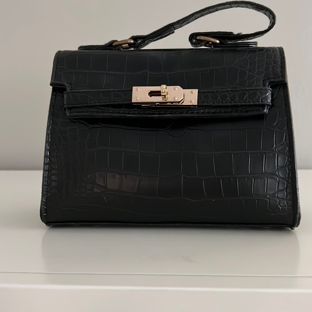 Small black leather bag